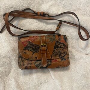 Patricia Nash Brown Leather Travel-Print Wallet with Buckle Strap